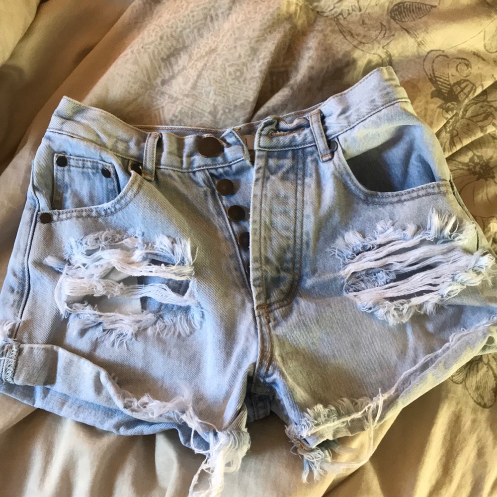 Distressed denim shorts